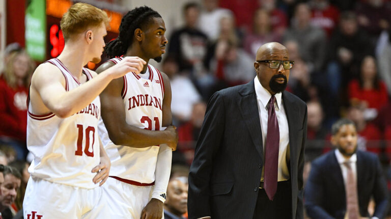 Indiana coach Mike Woodson reacts to “Fire Woodson” chants after the Illinois loss